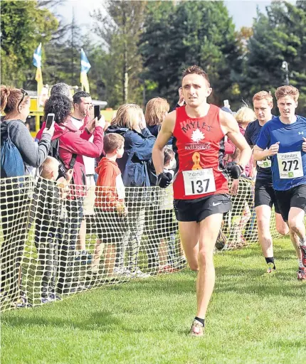  ??  ?? LEADING THE WAY: Aberdeen runner Miles Edwards heads the field in the dandara 5k run at Hazlehead Park in