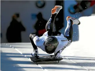  ?? PHOTO: GETTY IMAGES ?? Kiwi bobsled racer Rhys Thornbury throws himself down the course during a World Cup event in Utah in November last year.