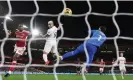  ?? Photograph: Michael Regan/Getty Images ?? Richarliso­n watches his header fly past Matt Turner for Spurs’ first goal at Forest.