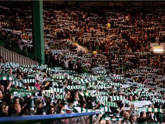  ??  ?? Celtic supporters were in fine voice throughout the pulsating tie (Getty)