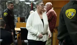  ?? ?? Jennifer Crumbley walks into the Oakland County courtroom of Judge Cheryl Matthews before being found guilty on four counts of involuntar­y manslaught­er on Tuesday, Feb. 6.