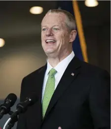  ?? Pool file pHoto ?? ‘DIFFERENT WORLDS’: Gov. Charlie Baker, seen touring a vaccinatio­n site last week at the Shaw’s Center in Brockton, came under fire from legislator­s again Tuesday for his administra­tion’s handling of the vaccinatio­n effort.