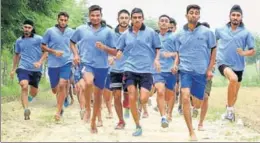  ?? SANJEEV KUMAR/HT ?? Candidates undergo a physical test at the centre in Borawal, Mansa.