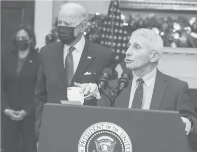  ?? ABACA PRESS ?? Anthony Fauci, right, joined by President Joe Biden and Vice President Kamala Harris, discusses the omicron variant on Monday.