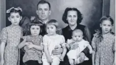  ??  ?? Freeland’s maternal grandparen­ts, Michael and Alexandra Chomiak, with their children in 1952. Freeland’s mother, Halyna, is second from left.