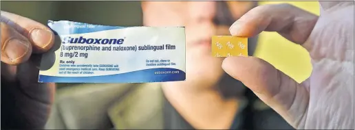  ?? [LESLYE DAVIS/THE NEW YORK TIMES] ?? Addicts can get $15 to $20 for a “film strip” of the synthetic opioid Suboxone, which is intended for use in helping heroin and opioid users to beat their addictions.