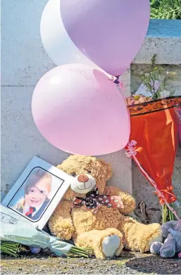  ?? Picture: PA. ?? Tributes near a house on the Isle of Bute, after the body of Alesha MacPhail was found in woodland on the site of a former hotel on July 2 last year.