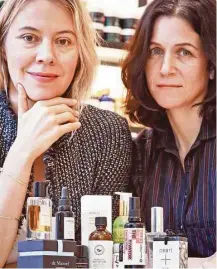  ?? Bebeto Matthews / Associated Press ?? Kerrilynn Pamer, left, and Cindy DiPrima Morisse, owners of CAP Beauty in New York, said 40 percent of the store’s top 10 products are ingestible items made of exotic ingredient­s.