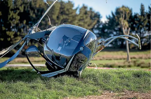  ?? PHOTO: WARWICK SMITH/STUFF ?? One man from this helicopter was taken to Palmerston North Hospital. He is in a stable condition.