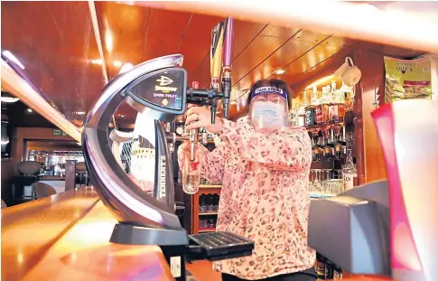  ??  ?? READY: Shenna Cochrane of the Vault in Monifieth cannot sell alcohol indoors until May. Picture by Gareth Jennings.