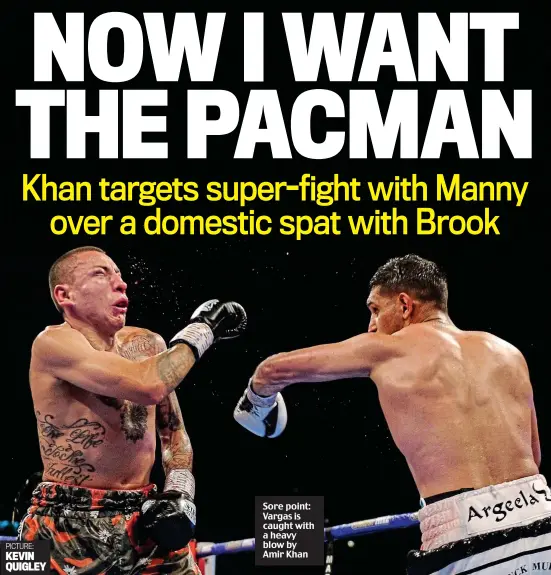  ?? PICTURE: KEVIN QUIGLEY ?? Sore point: Vargas is caught with a heavy blow by Amir Khan