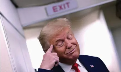  ?? Photograph: Carlos Barría/Reuters ?? Donald Trump on Air Force One on the way back to Washington from New Hampshire in August 2020.