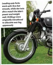  ??  ?? Leading axle forks work well, firm but smooth, while the twin discs match the bike’s power and weight well. Drillings were originally introduced to alleviate wet-lag, apparently