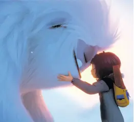  ?? AP ?? The yeti, Everest (left), and Yi, voiced by Chloe Bennet, in a scene from ‘Abominable’.