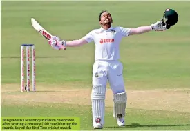  ?? ?? Bangladesh’s Mushfiqur Rahim celebrates after scoring a century (100 runs) during the fourth day of the first Test cricket match