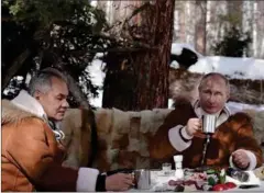 ?? ARKIVFOTO: RITZAU SCANPIX ?? Shoigu og Putin i et klassisk pr- foto.