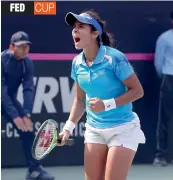  ??  ?? Ankita Raina celebrates her win over Chinese Taipei’s Chieh- Yu Hsu in the Fed Cup on Saturday.