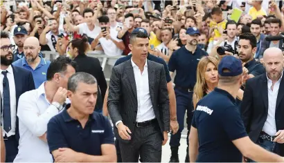  ?? Picture: AFP ?? BIG TALK. Cristiano Ronaldo, arriving for his medical, said that he’s ‘different’ from other players of his age who move to China for mega-money deals, during his official unveiling as a Juventus player yesterday.