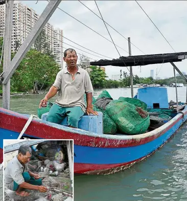  ?? — GARy CHEN/The Star ?? tough task: yeoh going to work in his trusty boat. (inset) Offering prayers to the dead near the jetty along Tun Dr Lim Chong Eu Expressway in Jelutong.