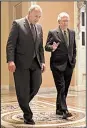  ?? AP/PABLO MARTINEZ MONSIVAIS ?? Senate Minority Leader Charles Schumer (left) and Majority Leader Mitch McConnell walk to the Senate chamber Wednesday after reaching a budget agreement.