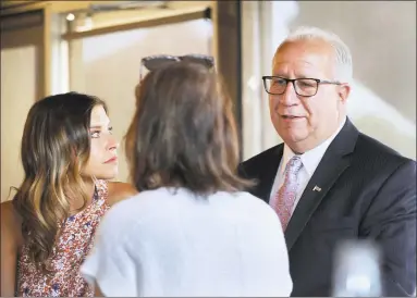  ?? Carol Kaliff / Hearst Connecticu­t Media ?? Rich Dupont, right, at a campaign fundraiser in Watertown in June.
