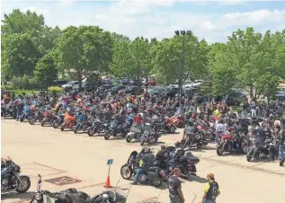  ?? HARLEY-DAVIDSON OF MADISON ?? Bikers get ready to ride the first stage of the Patriot Tour, a 48-state motorcycle journey that started Saturday in Beaver Dam and Madison.