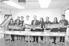  ??  ?? Raymond (fifth left) and Mitsuhiko (third right) with The Journey team after a press conference yesterday. Also seen is Sabah Associatio­n of Travel and Tour Agents president Dato Seri Winston Liaw (sixth left).