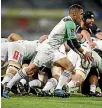  ?? PHOTO: GETTY IMAGES ?? Aaron Smith prepares to kick from the back of the scrum against the Brumbies.