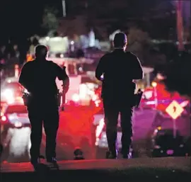  ?? Nhat V. Meyer Bay Area News Group ?? VEHICLES DEPART the Gilroy Garlic Festival after Sunday’s shooting. The three officers who responded to the rampage were hailed by the chief as heroes.