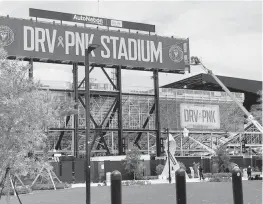  ?? SBI Soccer ?? Signs were being installed at Inter Miami’s ‘DRV PNK Stadium this week. A formal announceme­nt of the naming rights is expected Friday.