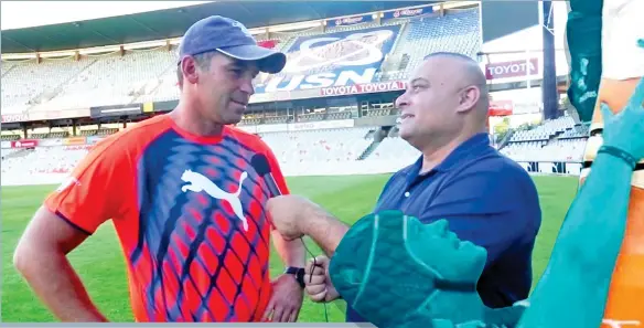  ??  ?? Ajay Bhai Amrit interviews Super Rugby Cheetahs coach Franco Smith.