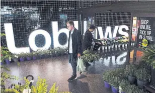  ?? NATHAN DENETTE THE CANADIAN PRESS FILE PHOTO ?? Loblaw, owned by George Weston, is spending about $90 million every four weeks in costs related to the pandemic, including temporary wage increases for workers.