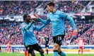  ?? Freiburg. Photograph: Tom Weller/AP ?? Patrik Schick (right) celebrates scoring Bayer Leverkusen’s third goal in victory over