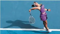  ?? HAMISH BLAIR THE ASSOCIATED PRESS ?? Mississaug­a’s Bianca Andreescu serves to Mihaela Buzarnescu in the first round of the Australian Open tennis championsh­ip in Melbourne on Monday. Andreescu won, 6-2, 4-6, 6-3, one of five Canadians to grab a victory on Day 1 of the tourney.