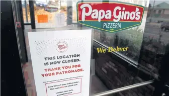  ?? AP ?? OFF THE MENU: The Papa Gino’s in Marlboro is one of 47 Papa Gino’s locations that closed without advance notice this week.