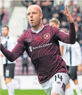  ?? Picture: SNS. ?? Hearts skipper Steven Naismith took a 50% pay cut.