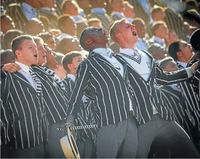  ?? Picture: Kevin Sutherland ?? Boys from Jeppe Boys’ High in Johannesbu­rg in full cry before a rugby match against King Edward VII School. A New Zealand study says boys at single-sex schools do better academical­ly than those who share a classroom with girls.