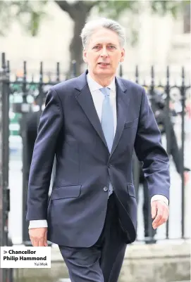  ?? Yui Mok ?? Chancellor Philip Hammond