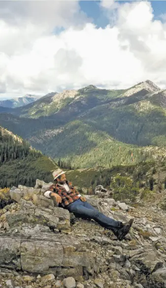  ?? Tom Stienstra / The Chronicle ?? Jeffrey Patty reclines atop Jedediah Mountain east of Crescent City. Known as “Foonski,” he found the “power of place” in such obscure, off-the-beaten path spots.