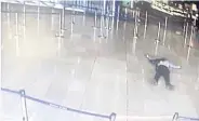  ??  ?? An airport CCTV screen image shows a man on the ground inside Orly Sud terminal following a shooting incident at the airport near Paris.
