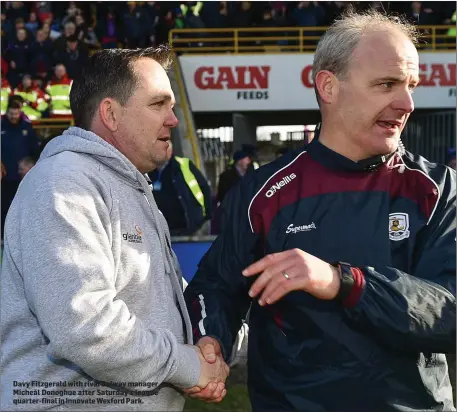  ??  ?? Davy Fitzgerald with rival Galway manager Micheál Donoghue after Saturday’s league quarter-final in Innovate Wexford Park.