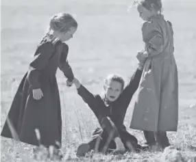  ??  ?? Girls play in Colorado City, Ariz., last month. The community and its sister city of Hildale, Utah, have been home for more than a century to a polygamous sect that is an offshoot of mainstream Mormonism.