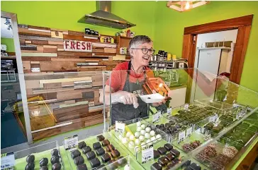  ?? BRADEN FASTIER/STUFF ?? Choco Loco owner Yvonne Dorner in her award-winning Ta¯kaka chocolate shop in Golden Bay.