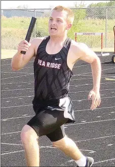  ?? Photograph­s courtesy of John McGee ?? Trevor Henry was one of four runners in the 4x800-meter relay which the Blackhawks won with a time of 8:42.3. Other runners in that relay were Shaed Cates, Josiah Small and Mac Smith.