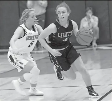  ?? Scott Herpst, file ?? Lafayette’s Latyah Barber tries to get around Heritage’s Riley Kokinda during a game last season. Now, a senior, Barber has been named the Walker County Girls’ Player of the Year two seasons in a row.