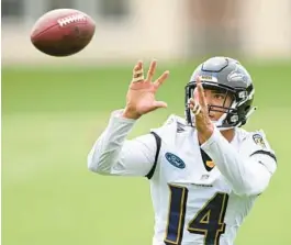  ?? GAIL BURTON/AP ?? Ravens rookie safety Kyle Hamilton left Wednesday’s training camp practice with an apparent injury, an early end to a disappoint­ing day.