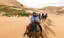  ?? INTREPID TRAVEL ?? Camel rides are one of many delightful experience­s on this eight-day trip.