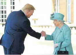  ?? AP ?? Britain’s Queen Elizabeth II greets President Donald Trump as he arrives for a welcome ceremony in the garden of Buckingham Palace, in London, Monday, June 3, 2019, on the first day of a three-day state visit to Britain.