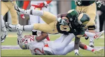  ?? DAVID ZALUBOWSKI/THE ASSOCIATED PRESS ?? Colorado State’s Dee Hart did get tackled now and then, but not enough times to prevent him from scoring six touchdowns.