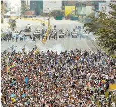  ?? | C. VERON/REUTERS ?? A ‘mãe de todas as marchas’ em Caracas